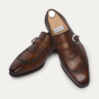 Buckle Loafers with Kiltie Fringe and Perforated Brogue Detailing in Brown