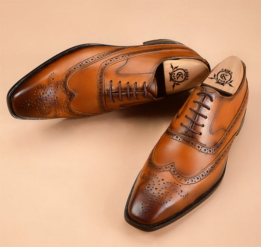 The Wingtip Tan Patina Oxfords