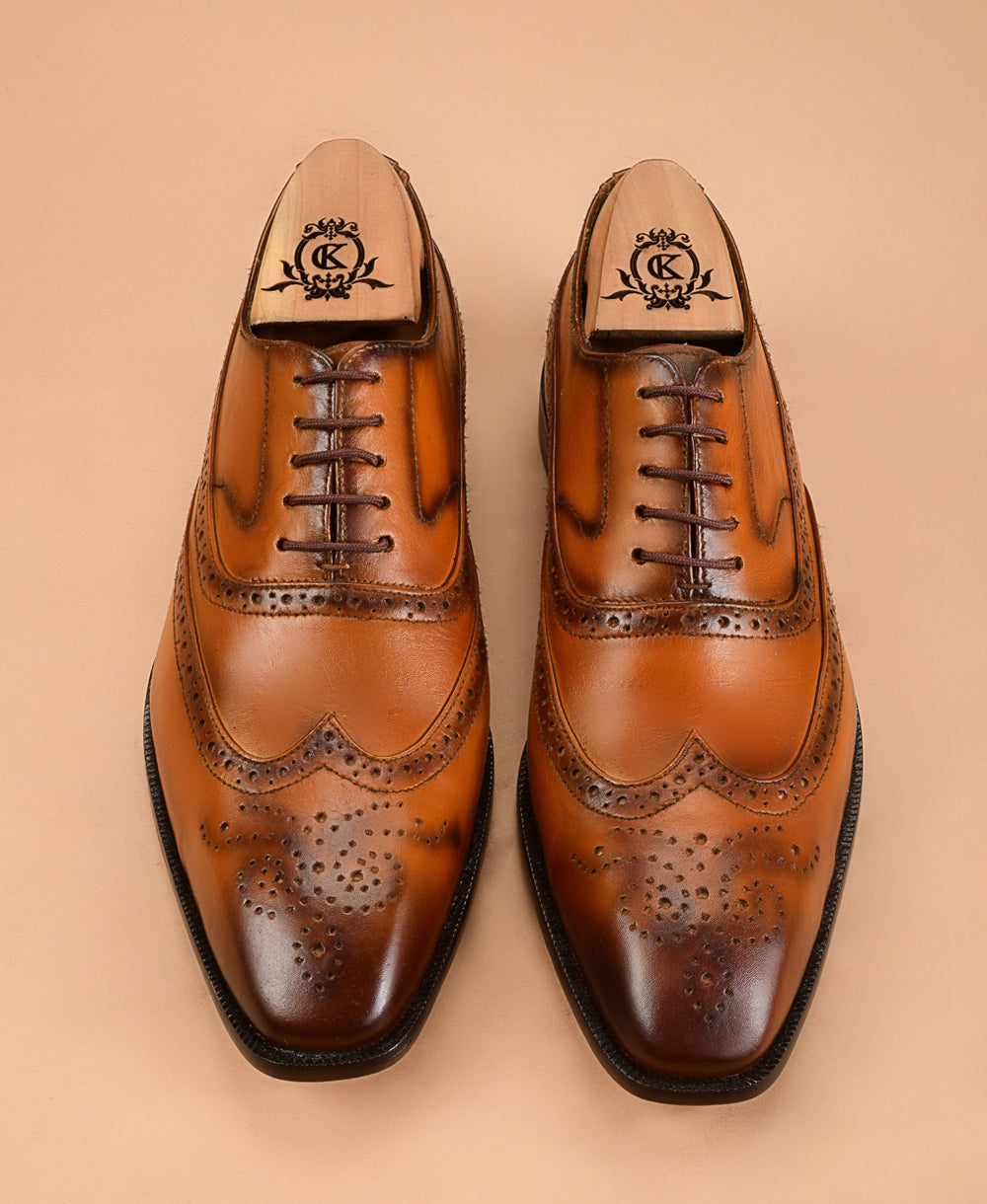 The Wingtip Tan Patina Oxfords