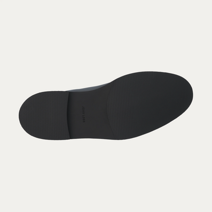 "Edmond" Leather Tassel Loafer with Hand-Stitched Apron in Black